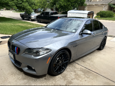 BMW 5 Series front view – polished exterior detail with M-Sport accents